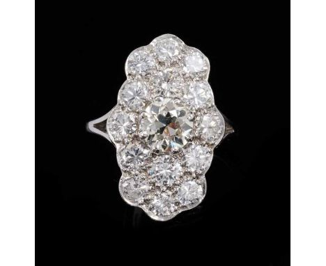 Diamond cluster ring, the plaque with a central old cut diamond estimated to weigh approximately 1.15cts surrounded by 14 pav