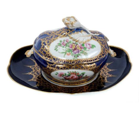 Worcester oval sauce tureen, cover and stand, circa 1772-75, polychrome painted with flowers on a cobalt blue and gilt ground