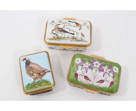 Three enamel boxes, including box decorated with a partridge by Halcyon Days, 5cm high, two others by Moorcroft. (3)