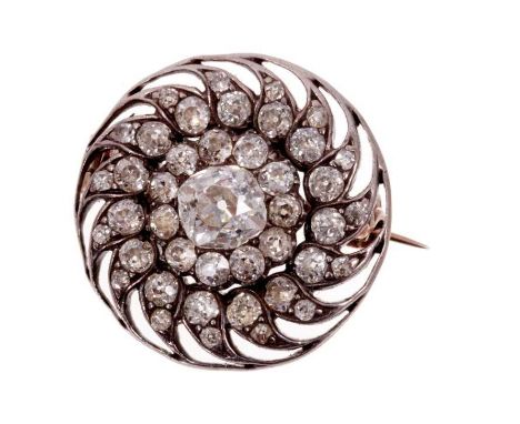 Victorian diamond target brooch, the stylised flower with central cushion-shape old cut diamond surrounded by old cut diamond