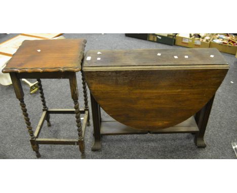 An early-20th Century shaped square occasional table, pie crust edging, barley twist supports, c.1930; an oak oval drop-leaf 