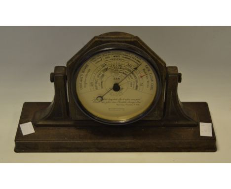 A bakelite desk barometer
