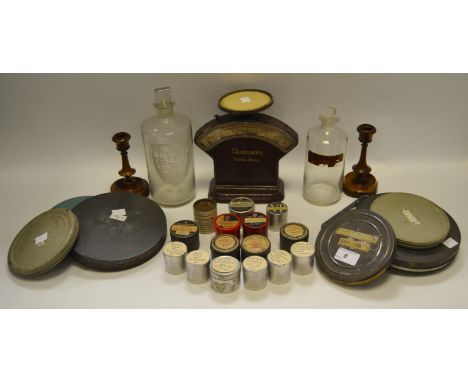 A Victorian labelled apothecary bottle; another, larger, etched; a set of 'Autoweigh' scales; a variety of cased film reels; 