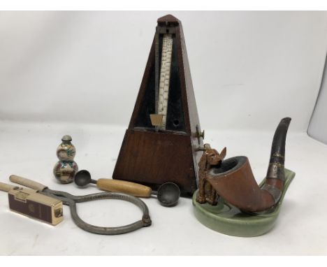 An assortment of mixed collectables including Wade, a Perry & Co. travelling ink well, a Dunhill lighter, a miniature double 