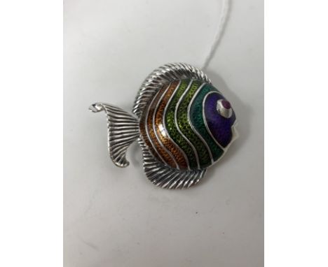 A silver and enamel pendant/brooch in the form of an angel fish with ruby eyes.