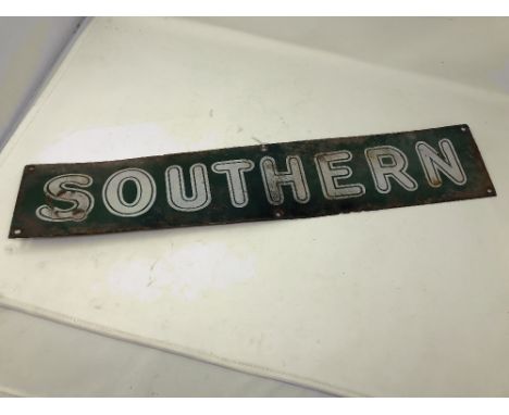 A vintage Southern Region enamel sign.