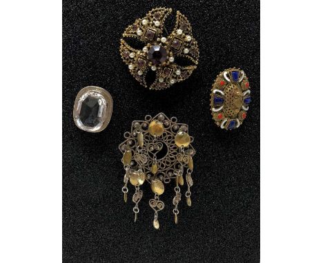 Four unusual brooches including Indian silver and an enamel brooch with filigree decoration; also an assortment of costume je