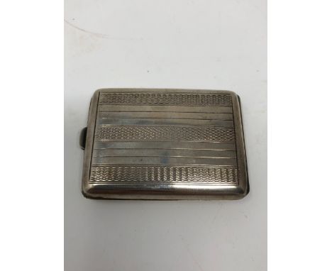 A silver pocket matchbox holder with engine turned decoration to the case. Maker Robert Pringle and Sons, Birmingham 1927.