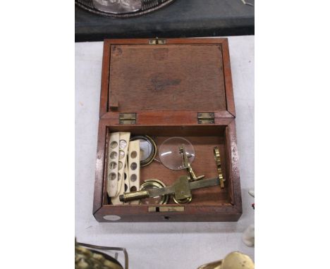 A VINTAGE BOXED OPTICAL INSTRUMENT