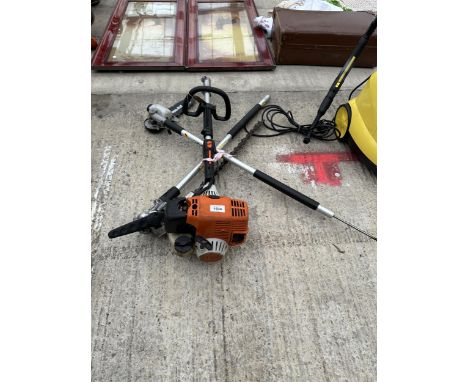 A STIHL KM100R LONG REACH MULTITOOL WITH HEDGE CUTTER AND CHAINSAW ATTATCHMENTS