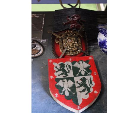 THREE VINTAGE SHIELDS WITH ARMORIAL DESIGNS