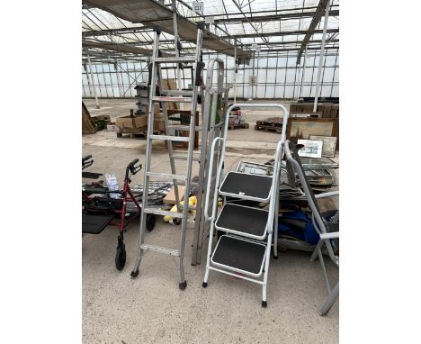 THREE VARIOUS STEP LADDERS TO INCLUDE A NON SLIP AND A FOUR RUNG ALUMINIUM EXAMPLE ETC