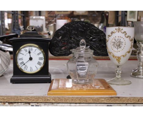 A MANTLE CLOCK, CAST TREE SHAPED RECIPE HOLDER, LARGE OPALINE GOBLET WITH GILT DESIGN, FRAMED TILE AND A BON BON JAR