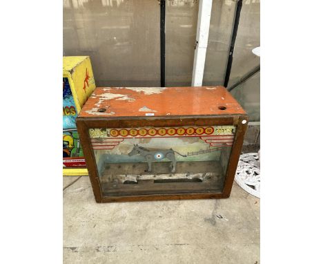 A VINTAGE ARCADE TARGET MACHINE