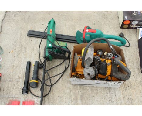 AN ELECTRIC CHAINSAW, HEDGE TRIMMER, CHAINSAW FOR SPARES AND TWO TORCHES