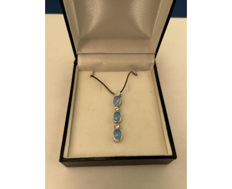 A MARKED SILVER NECKLACE WITH OPAL AND CLEARSTONE PENDANT IN A PRESENTATION BOX