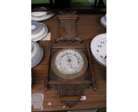 A LARGE VINTAGE OAK BAROMETER WITH ORNATE CARVING, BY D COHEN, JEWELLER, ALDERLEY EDGE