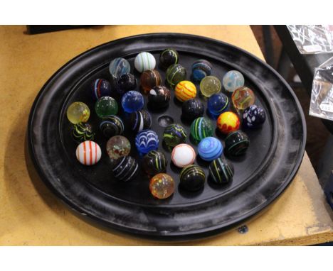 A LARGE SOLITAIRE BOARD WITH VINTAGE MARBLES