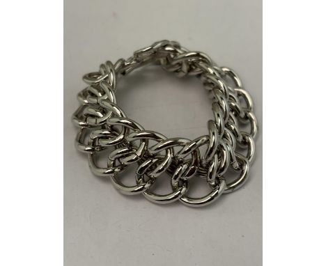 A HEAVY MONET WHITE METAL BRACELET