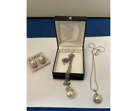 TWO NECKLACES WITH PEARL AND CLEAR STONE PENDANTS AND A PAIR OF MATCHING EARRINGS SOME CIRO IN A PRESENTATION BOX