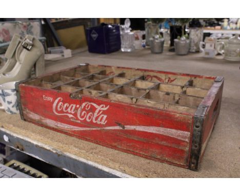 A VINTAGE WOODEN COCA-COLA CRATE WITH SPACE FOR 24 BOTTLES