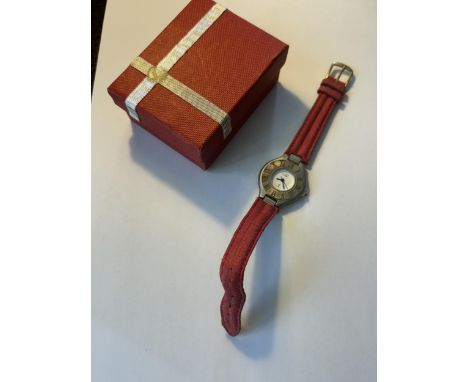 A VINTAGE MUST DE CARTIER STAINLESS STEEL LADIES WRIST WATCH WITH RED LEATHER STRAP