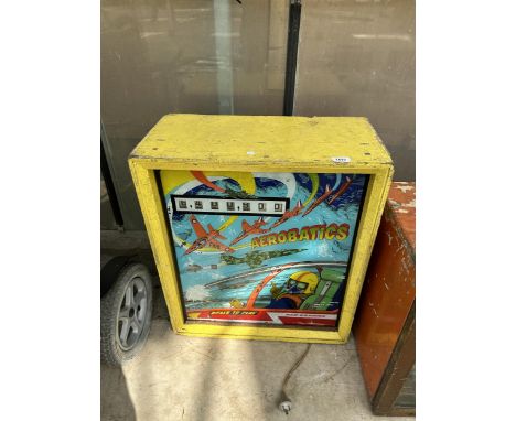 A VINTAGE AEROBATICS ARCADE MACHINE