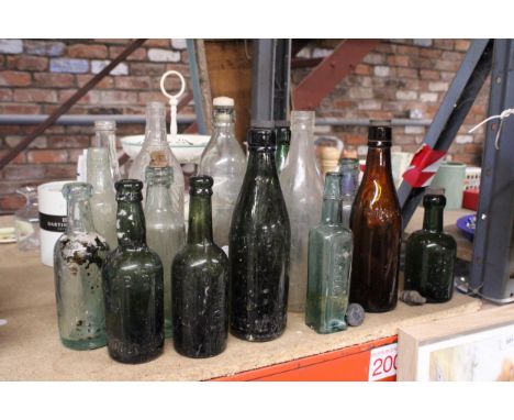 AN ASSORTMENT OF VINTAGE GLASS BOTTLES