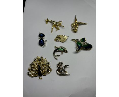 EIGHT VINTAGE BIRD/ ANIMAL BROOCHES WITH CLEAR AND COLOURED STONES