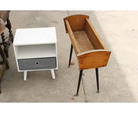 A PLANT TROUGH ON BLACK LEGS AND A SMALL BEDSIDE CHEST