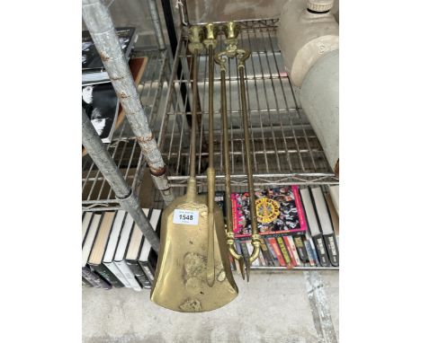 THREE VINTAGE BRASS COMPANION ITEMS TO INCLUDE TONGS, SHOVEL AND POKER WITH DECORATIVE BALL AND CLAW HANDLES