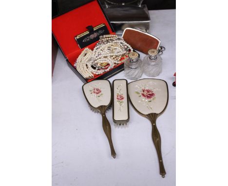 A VINTAGE PETIT POINT DRESSING TABLE SET TO INCLUDE TWO SCENT BOTTLES, BRUSHES AND A HAND MIRROR, A QUANTITY OF COSTUME JEWEL
