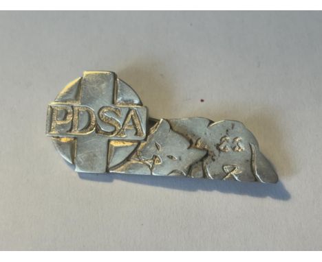 A MARKED SILVER VINTAGE PDSA BADGE