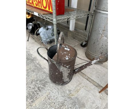 A VINTAGE PAINTED METAL WATERING CAN