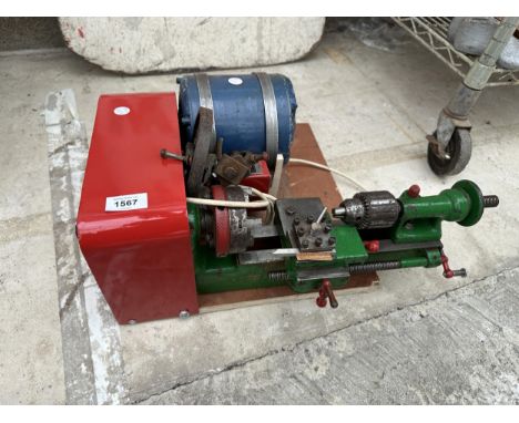 A VINTAGE MINIATURE WATCH MAKERS 'YORK' LATHE WITH FACEPLATE AND OTHER ACCESSORIES
