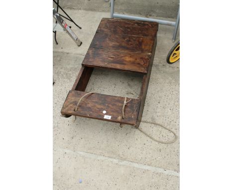 A VINTAGE WOODEN SLEDGE