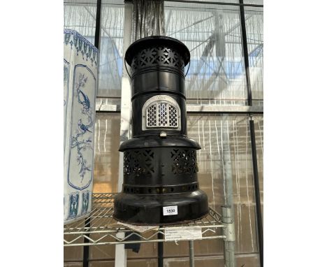A VINTAGE METAL VALOR OIL HEATER