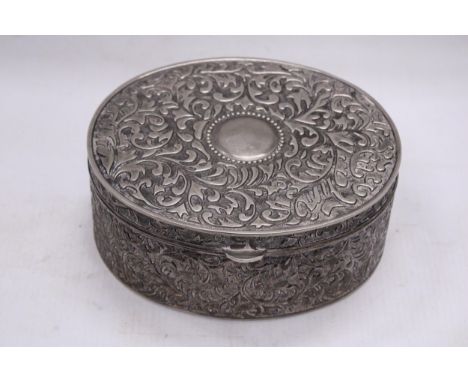 A LARGE VINTAGE SILVERPLATE OVAL REPOUSSE JEWELLERY CASKET