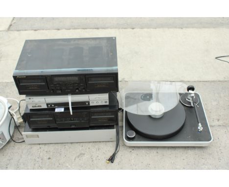 AN ASSORTMENT OF ITEMS TO INCLUDE A PIONEER CASSETTE DECK, A RECORD PLAYER AND AN LG VIDEO DOCTOR ETC