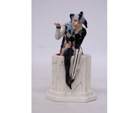 A CARLTONWARE HANDPAINTED SHOW SPECIAL JESTER FIGURE