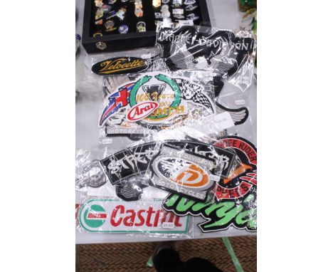 A QUANTITY OF AS NEW, CLOTH SEW-ON BADGES TO INCLUDE TRIUMPH, CASTROL, HARLEY-DAVIDSON, ETC.,