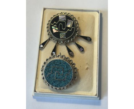TWO MEXICAN SILVER BROOCHES TO INCLUDE A TURQUOISE AND LAPIS AND A MOTHER OF PEARL AND ABALONE SHELL