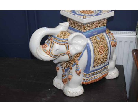 TWO CERAMIC GARDEN SEATS 
in the form of elephants 