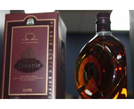 DIMPLE 15 YEARS OLD
Blended Scotch Whisky, 1 litre, 43% volume, in carton. 