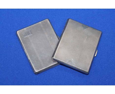 TWO ART DECO SILVER CIGARETTE CASES
each with engine turned design, Birmingham 1937 and 1939 respectively, approximately 180g