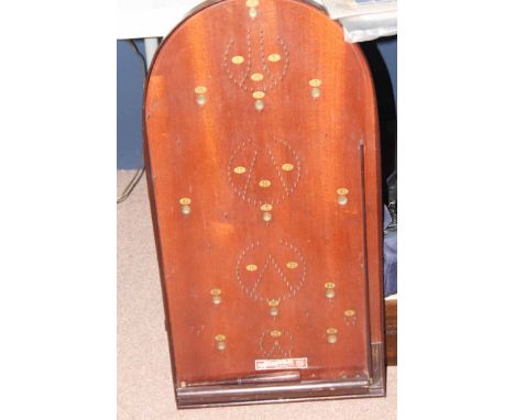 MAHOGANY BAGATELLE BOARD
with balls and pointer, 'Corninthian 2IT' board, 78cm high