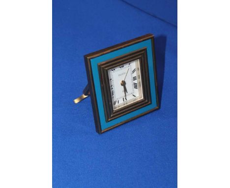 ENAMELLED BRASS GUCCI TRAVEL CLOCK
signed 8 day French keyless wind movement, the white dial with Roman numerals, the case wi
