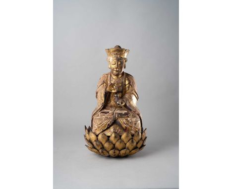 A LARGE CHINESE GILT-WOOD FIGURE OF A DAOIST IMMORTALMING DYNASTYDepicting the deity sitting in dhyanasana with his right han