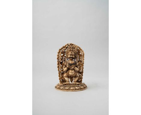 NO RESERVEA SINO-TIBETAN BONE FIGURE OF PANJARANATA MAHAKALA 18TH/19TH CENTURY  The deity is depicted holding a vajra, a scul