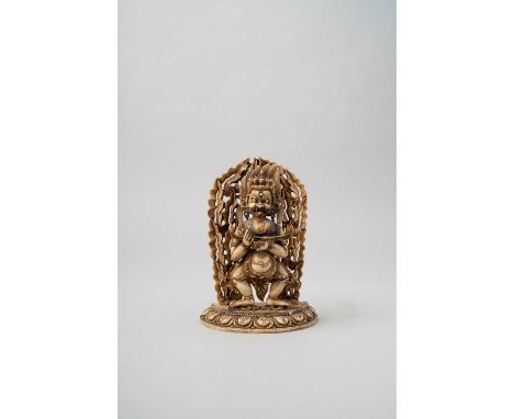 NO RESERVEA SINO-TIBETAN BONE FIGURE OF PANJARANATA MAHAKALA 18TH/19TH CENTURY  The deity is depicted holding a vajra, a scul